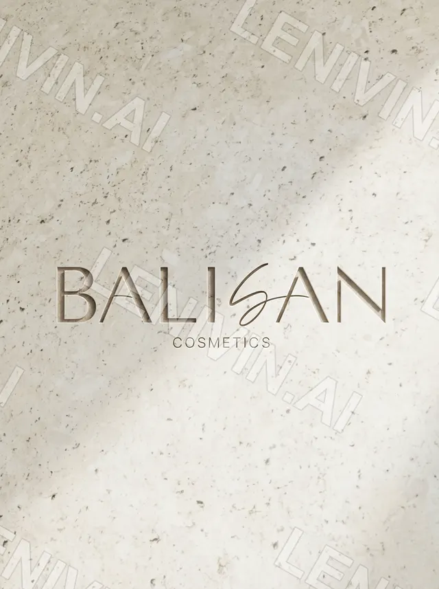 Логотип BALISAN Cosmetics выбит на светлой шероховатой каменной поверхности, косая тень