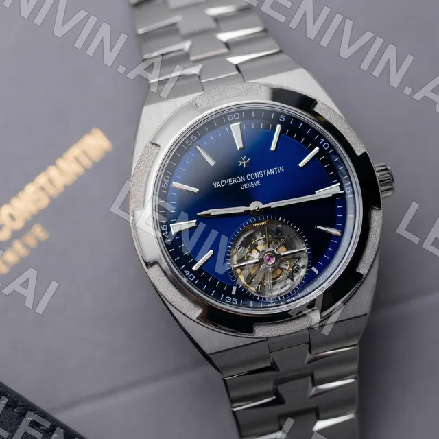 Наручные часы Vacheron Constantin с синим циферблатом и турбийоном на сером фоне